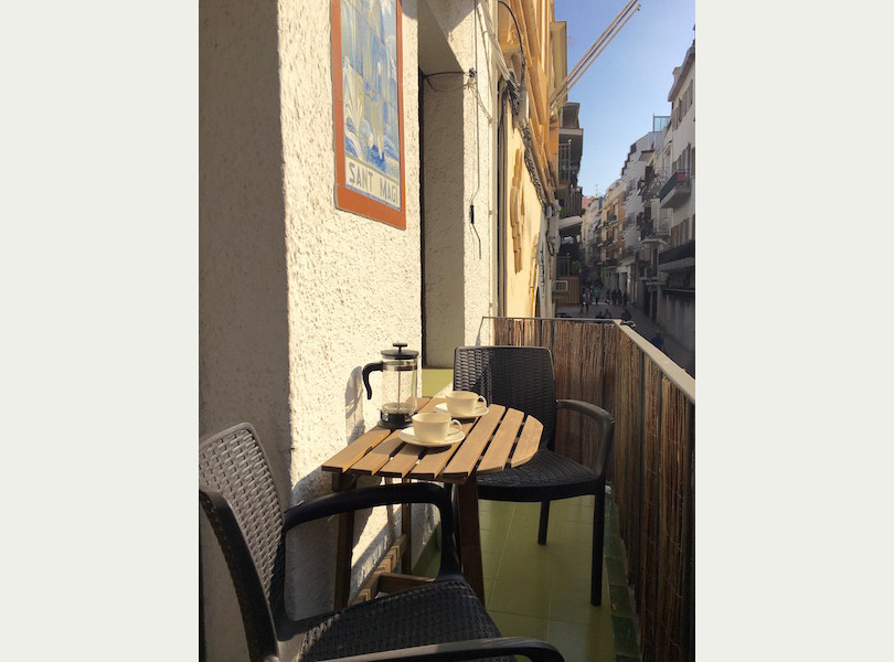 Sunny balcony looking out on to Parellades.